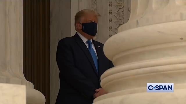 Protesters chant "Vote him out!" as President Trump pays respects at Supreme Court