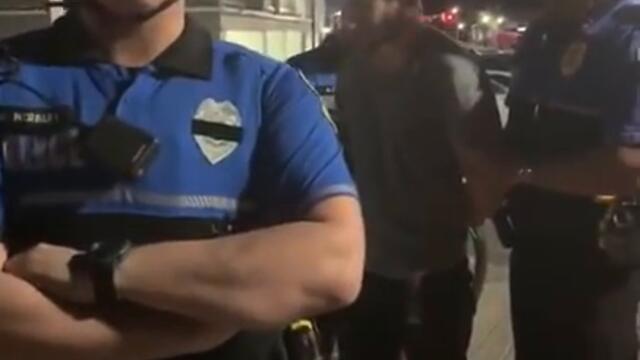 Cop punches man for calling him a pig.