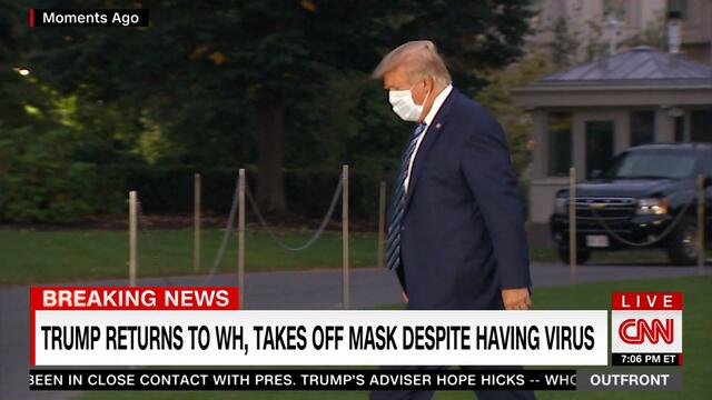 Contagious President Trump removes mask at White House