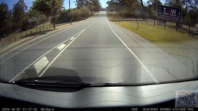 Speeding car overtakes 6 cars on wrong side of road and crashes - Queensland (Cam from oncoming car)