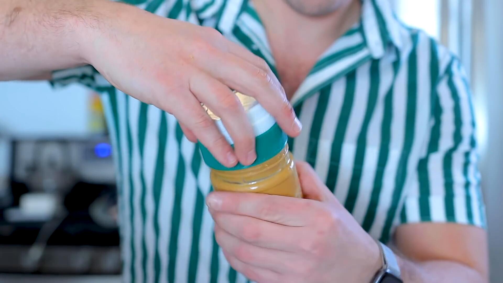 The Spinning Spread Scooper automatically cleans your peanut butter jars  hands-free! 