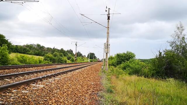 Long & heavy BDZ Freight Train with 3 locomotives sliding down from Vakarel to Verinsko in Bulgaria